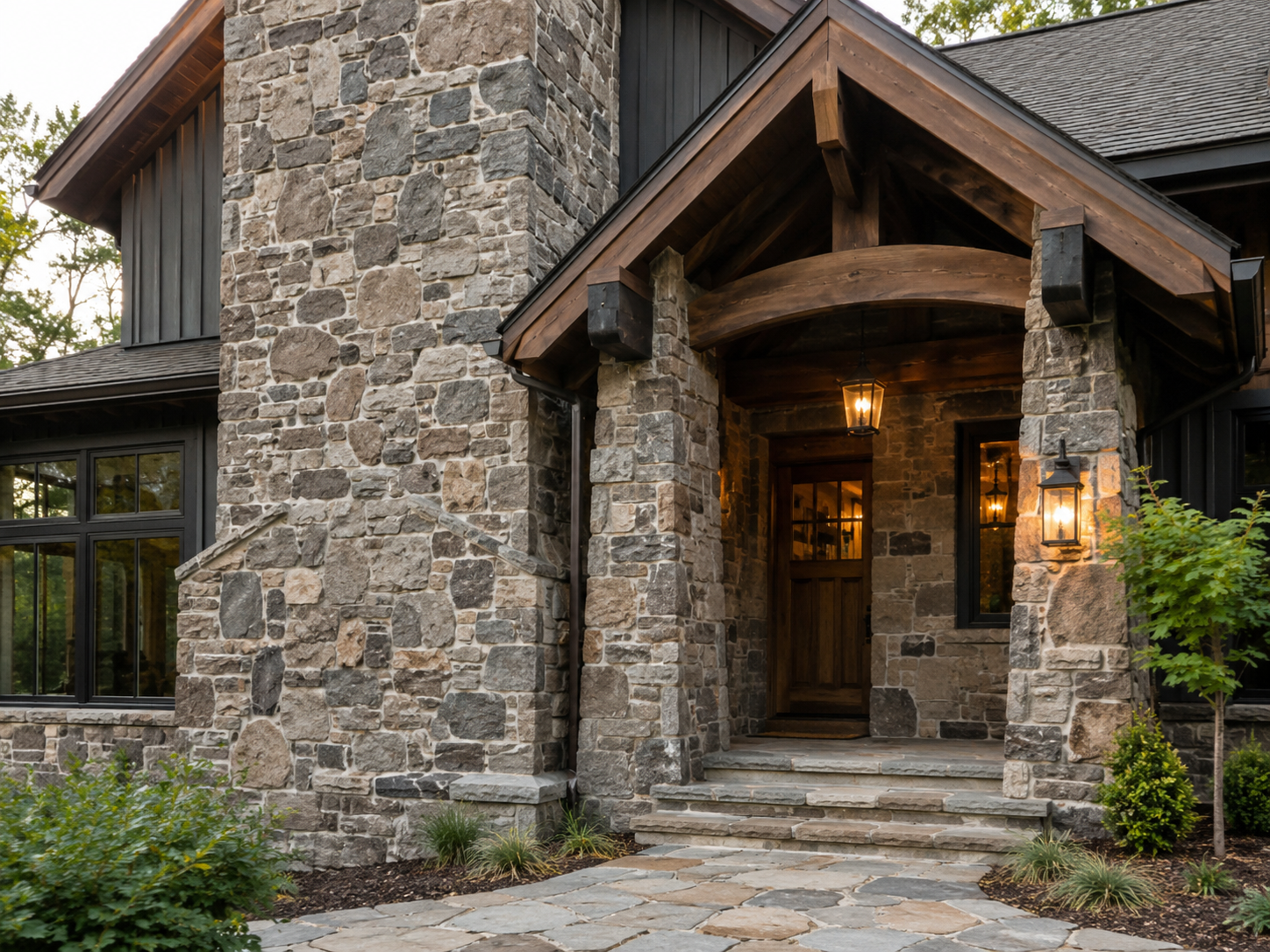 Stone-clad entry and architectural stone detail at a residence